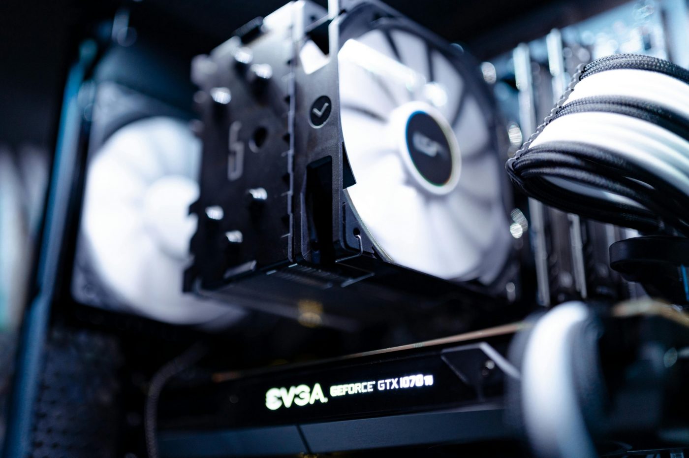 Detailed view of a cooling fan inside a modern gaming PC setup.